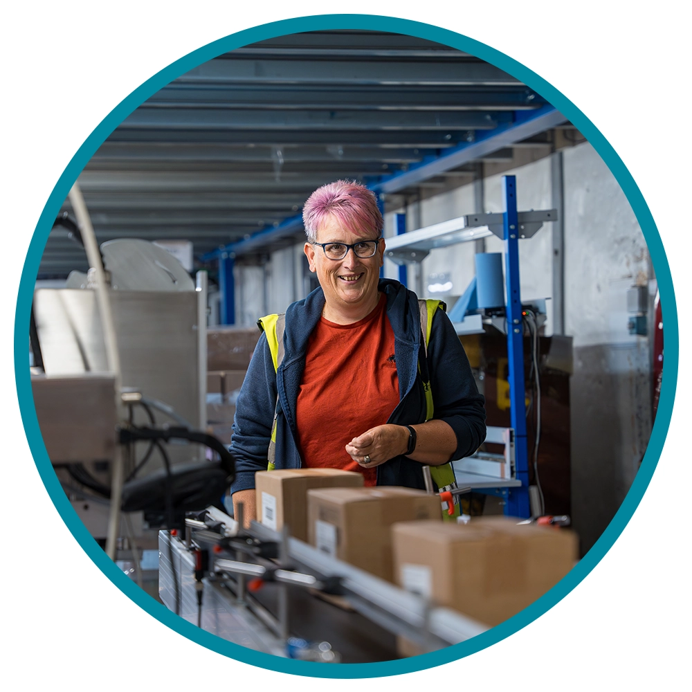 Contract packing- boxes on a conveyor belt