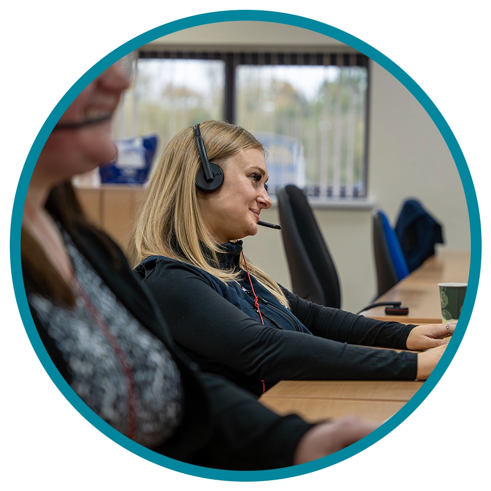 Multi-channel customer support- blonde lady talking through a headset