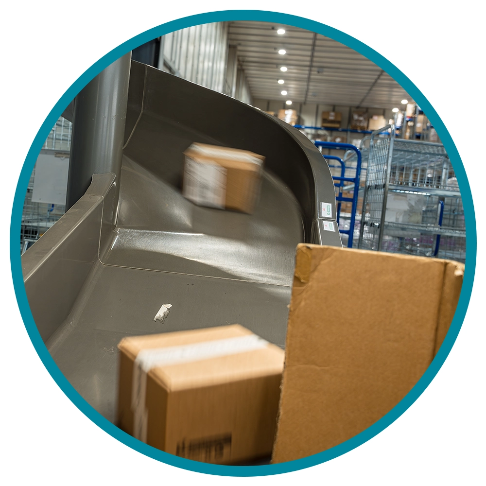 pick and pack services- boxes coming down a slide