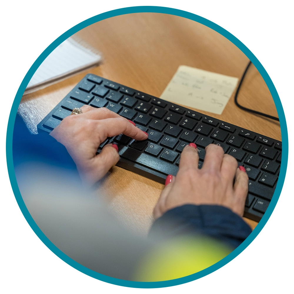 returns management- hands on a keyboard