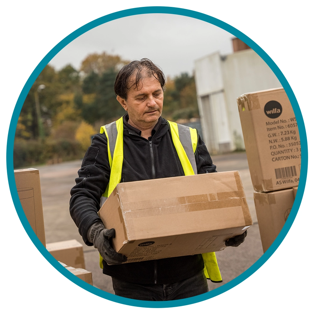 shipping services- man with cardboard box